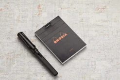Rhodia No. 11 A7 Notepad - Black, Lined -Office Supplies Sale Rhodia ClassicNotepad TopBound A4 No11 Stapled Lined Black 1